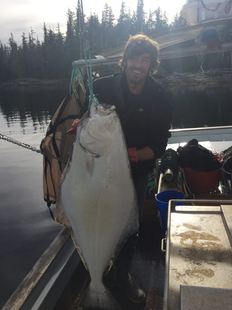 Chris Dabney, in Prince William Sound, holding a big-ass halibut. #justforthehalibut