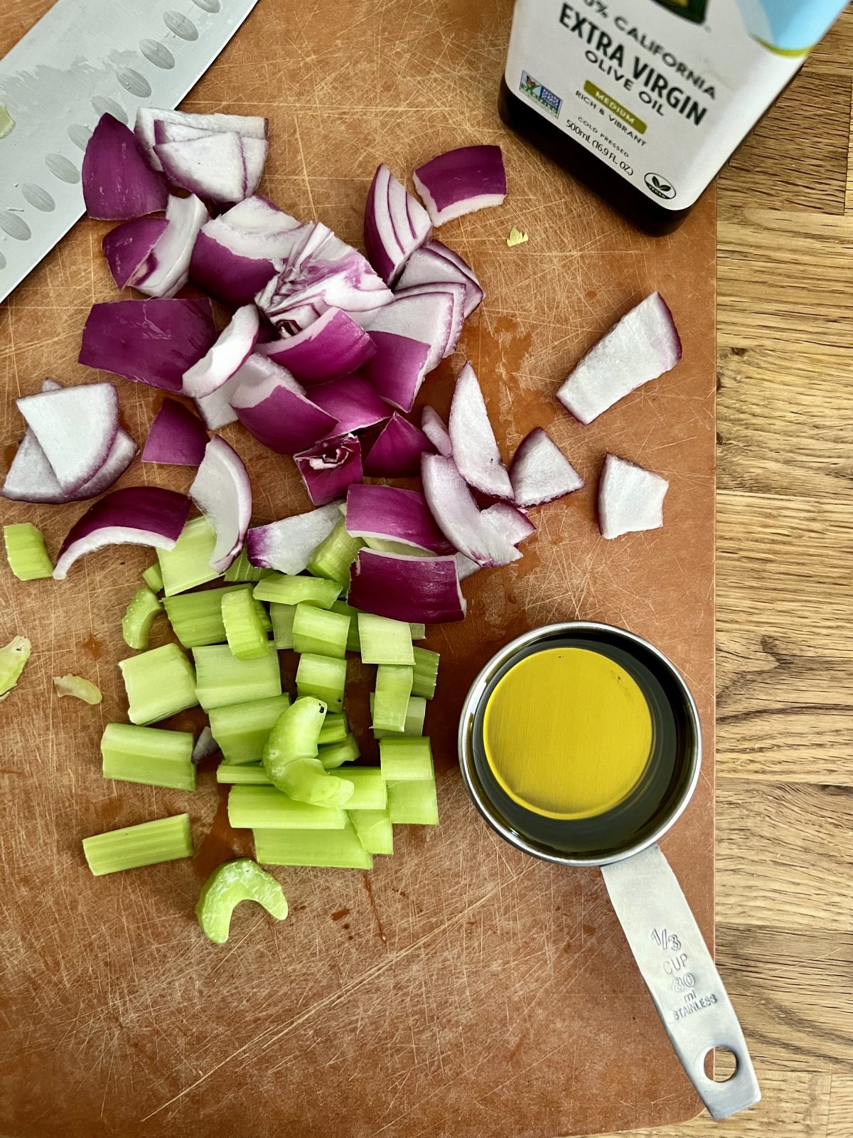 Chopped purple onions and celery with a third cup of olive oil