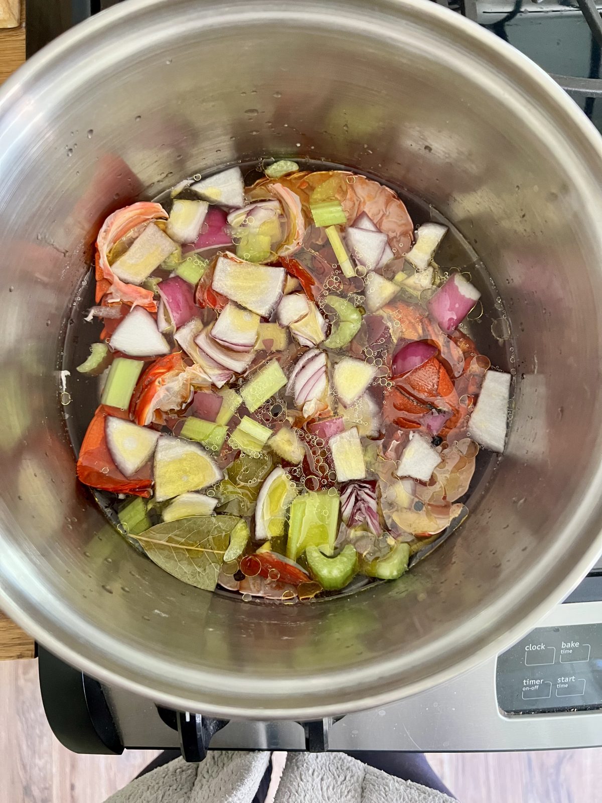 Spiny Lobster Stock made with oil and celery and purple onion
