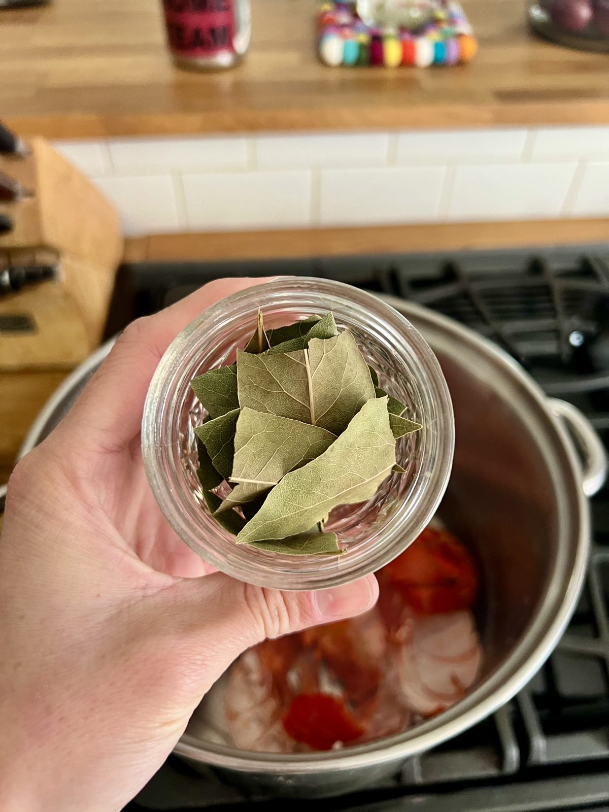 home dried bay leaves in a small mason jar