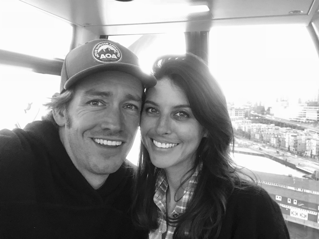 black and white selfie photo of a couple in the Seattle Ferris Wheel