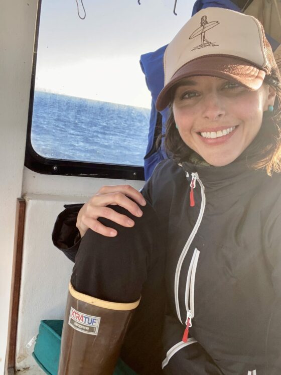 Megan Waldrep wearing legacy XTRATUF boots on a commercial lobster fishing boat
