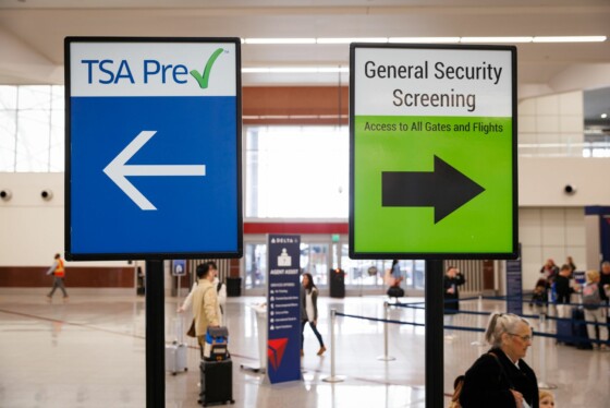 TSA Pre Check airport signs at security check point