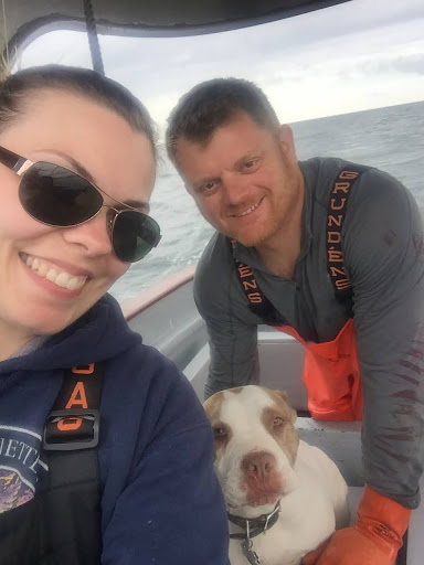 AMSEA Training Coordinator Ashley Green and fisherman husband Tyler on a fishing boat.